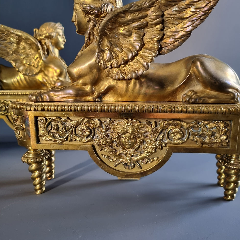 Thumbnail: Thomire, pair andirons with sphinxes, early 19th century.