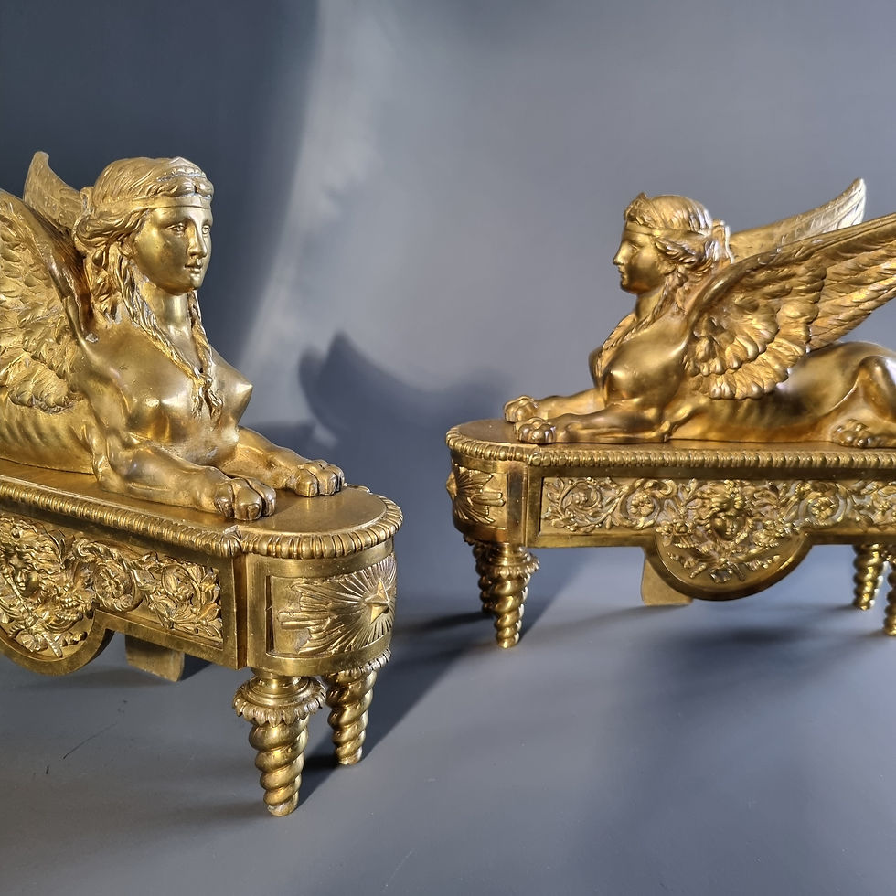 Thumbnail: Thomire, pair andirons with sphinxes, early 19th century.