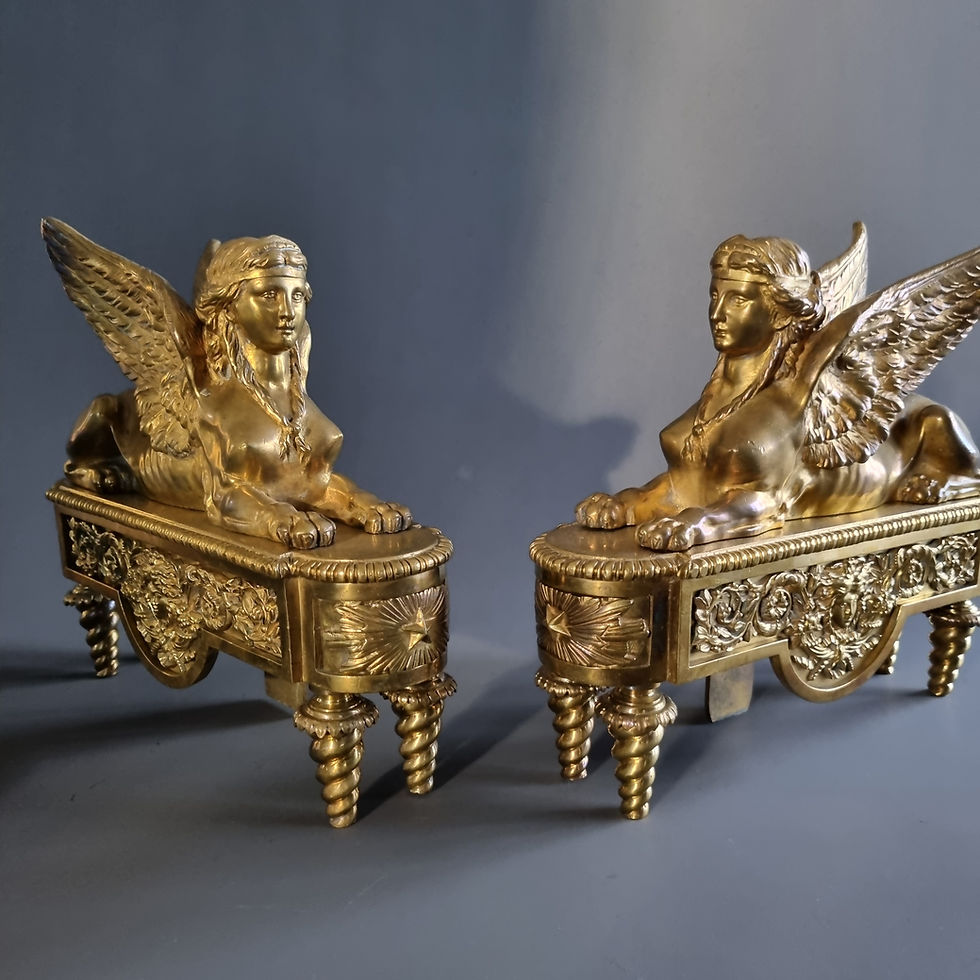 Thumbnail: Thomire, pair andirons with sphinxes, early 19th century.