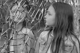 girl-schoolgirl-looks-sad-broken-mirror-black-white-photo-153621921.jpeg