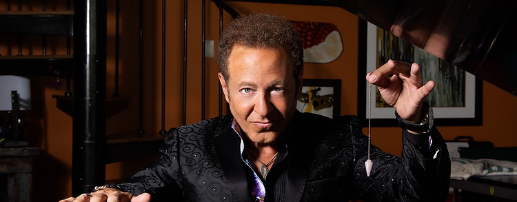 mentalist Sidney Friedman with pendulum