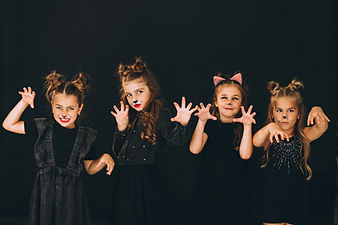 group-girls-dressed-halloween-costumes-studio.jpg