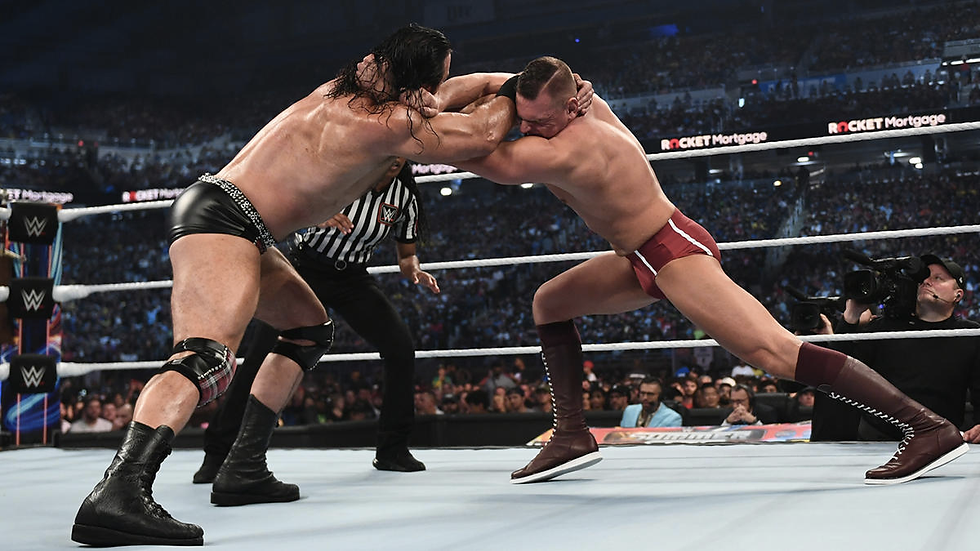 Drew and Gunther grapple