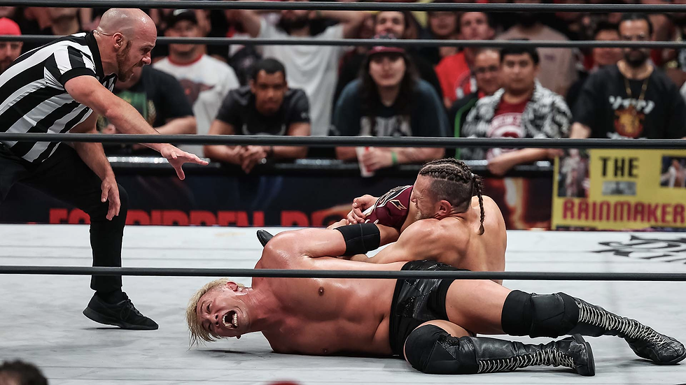 Bryan beats Okada