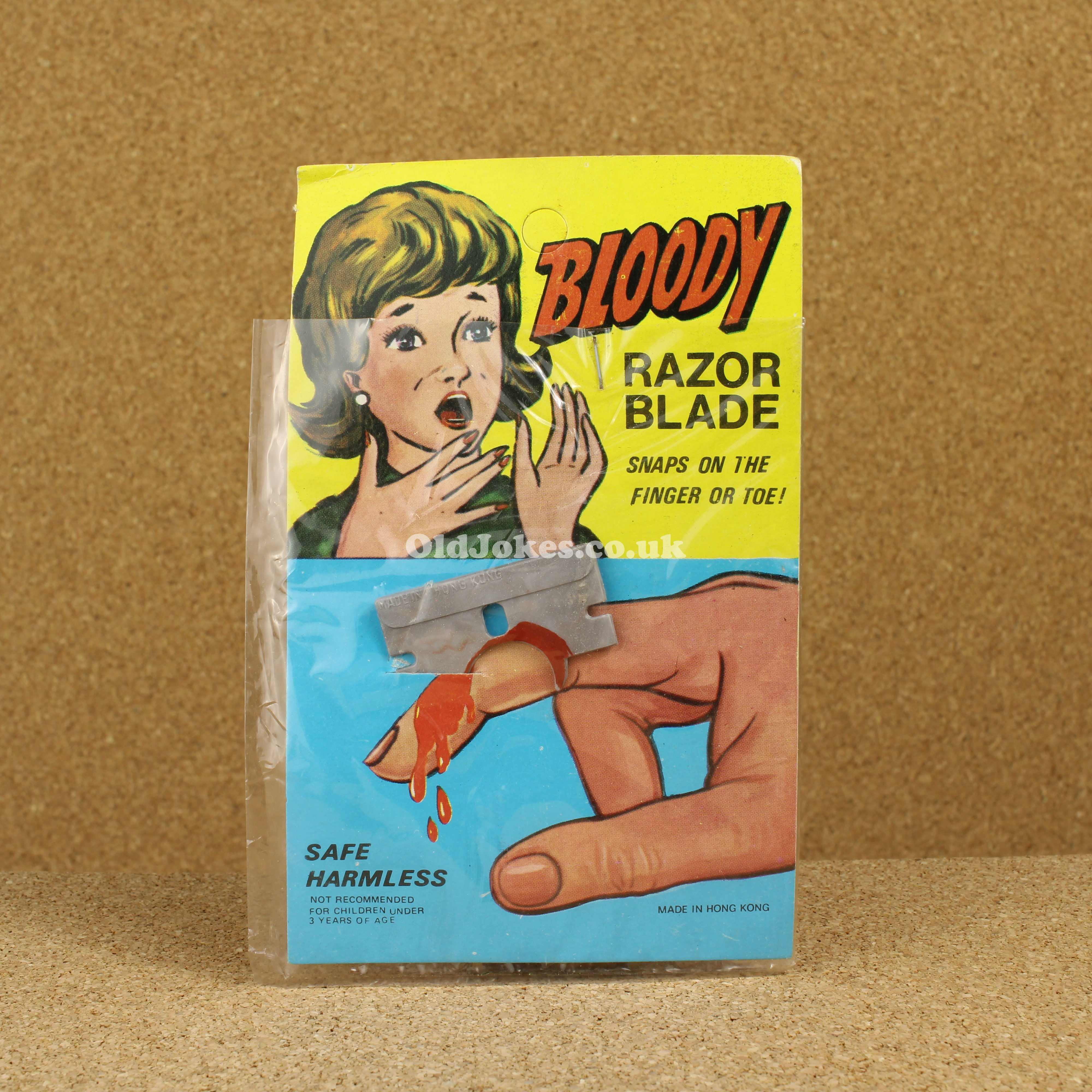 Bloody Razor Blade Through Finger