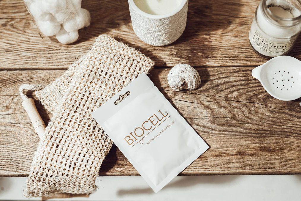 beauty face mask product on vintage wooden table 
