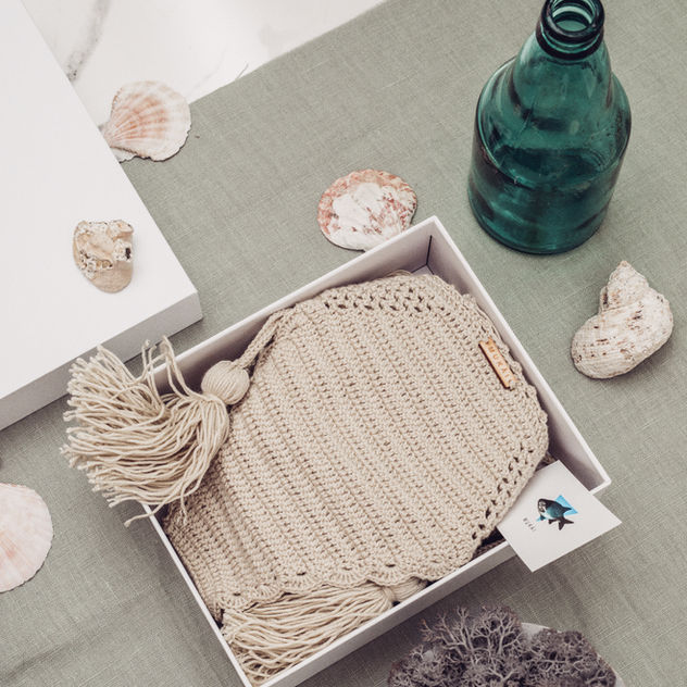 knitted bikini styled with green vintage bottle  and so sea shells 