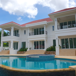 Back of mansion villa with swimming pool at Phoenix Gold Golf Club by 1010 Tech Construction