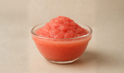 Guava – Bowl of pink guava purée naturally mild and aromatic for juices and baked goods