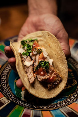 A person at Jacksonville's Horse Park is poised to enjoy a taco