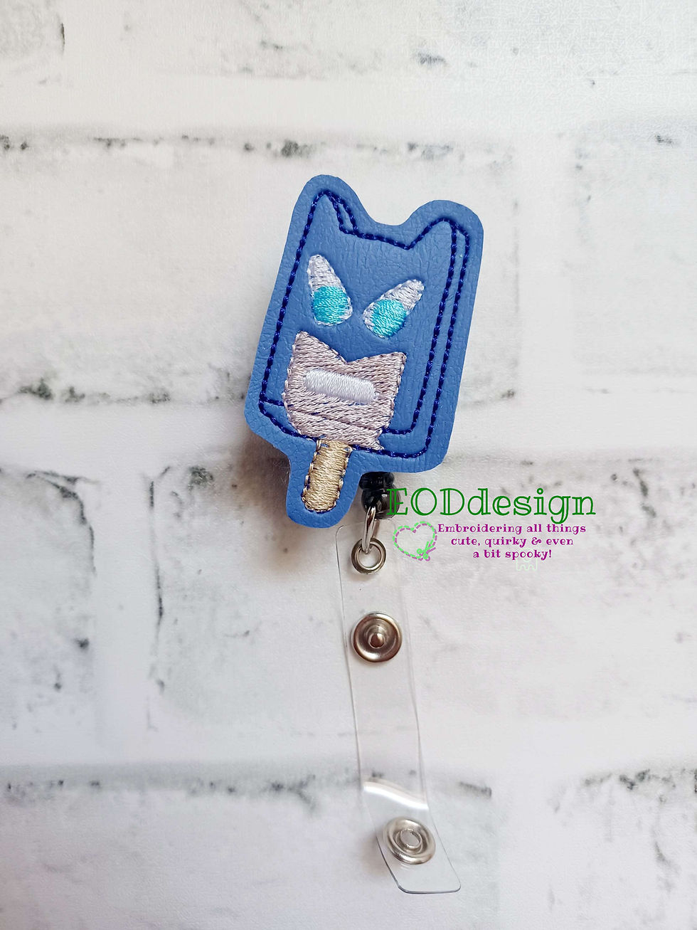 Bubblegum Eyeball Popsicle Bat Hero Badge Reel