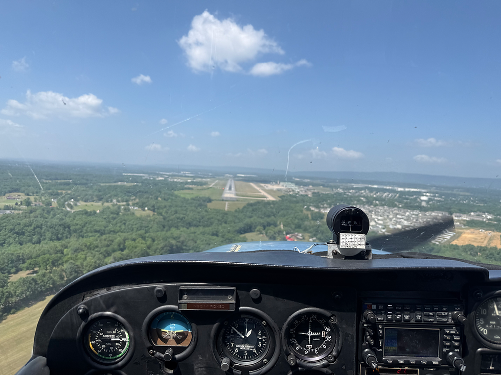View from an aircraft cockpit overlooking the runway during flight, representing the Fast-Track Instrument Rating program