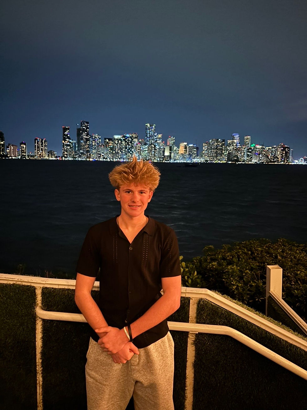 Bryce Pahula, founder of BAP Marketing, in front of a city skyline