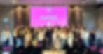 People posing to the camera during the Make Your Mark event