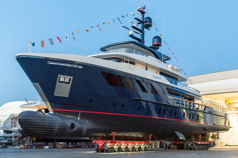 Superyacht moving from shipyard, preparing for launch
