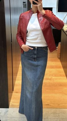 Red Leather Jacket Fall 2023 paired with a denim skirt and white top with a black bag. found on amazon and is a deep 2023 fall and winter trend thats here to stay