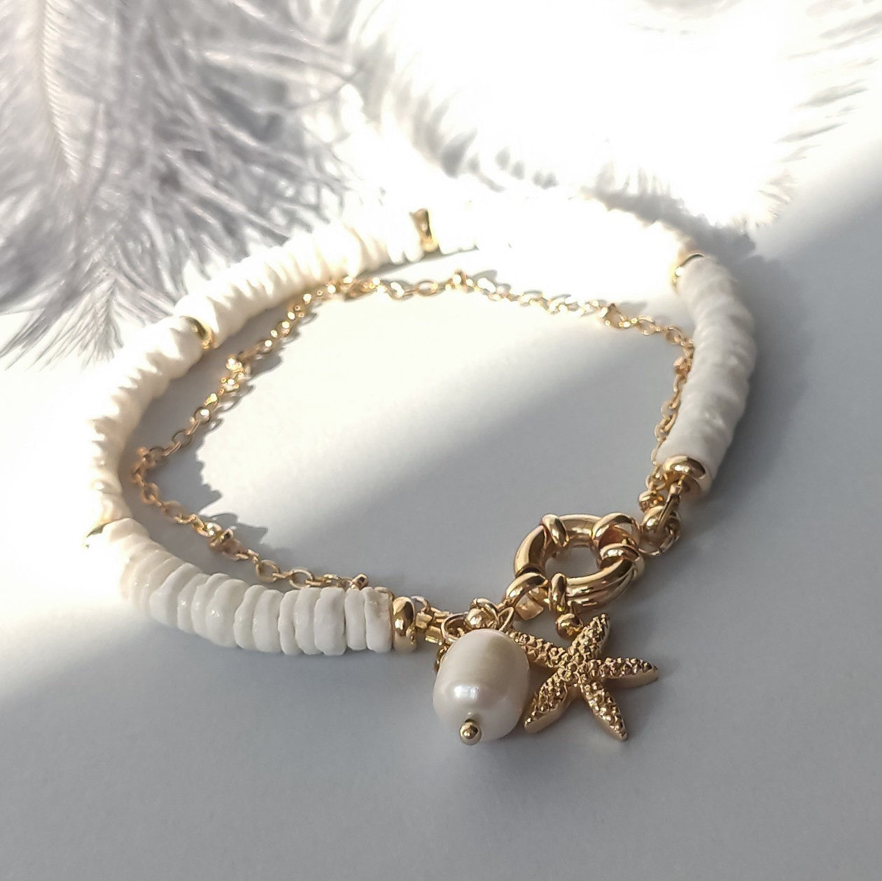 Shell bracelet with pearl and star