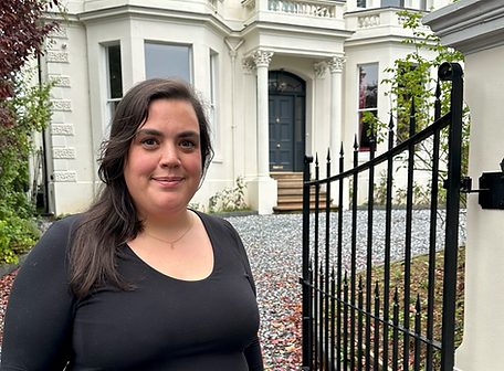 Ellie with house.png