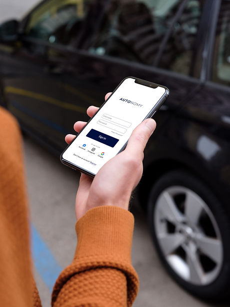 mockuuups-passenger-walking-towards-a-car-holding-an-iphone-11-mockup.jpeg