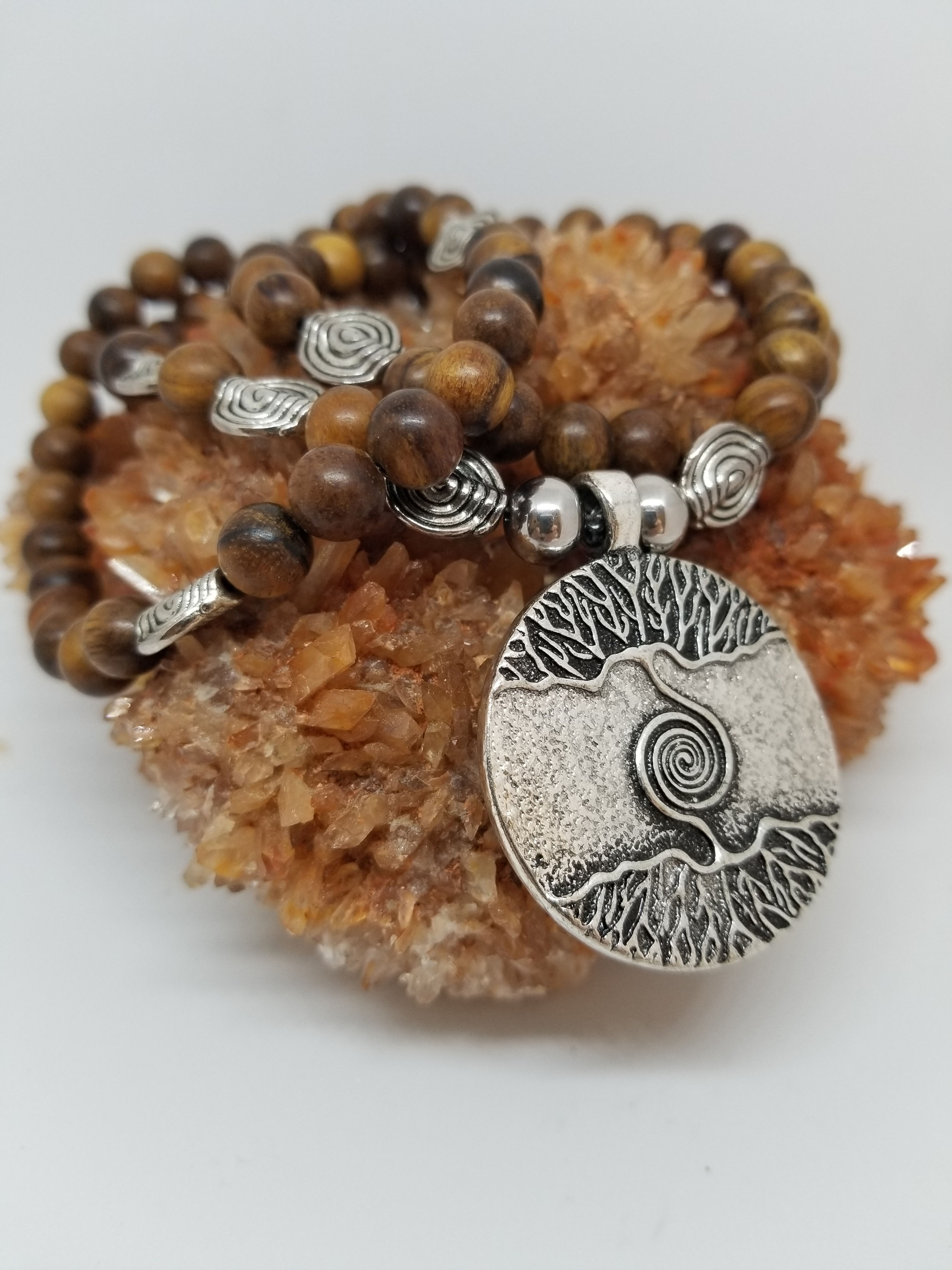 Tree of life pendant with brown wooden beads and silver alloy sp Necklace