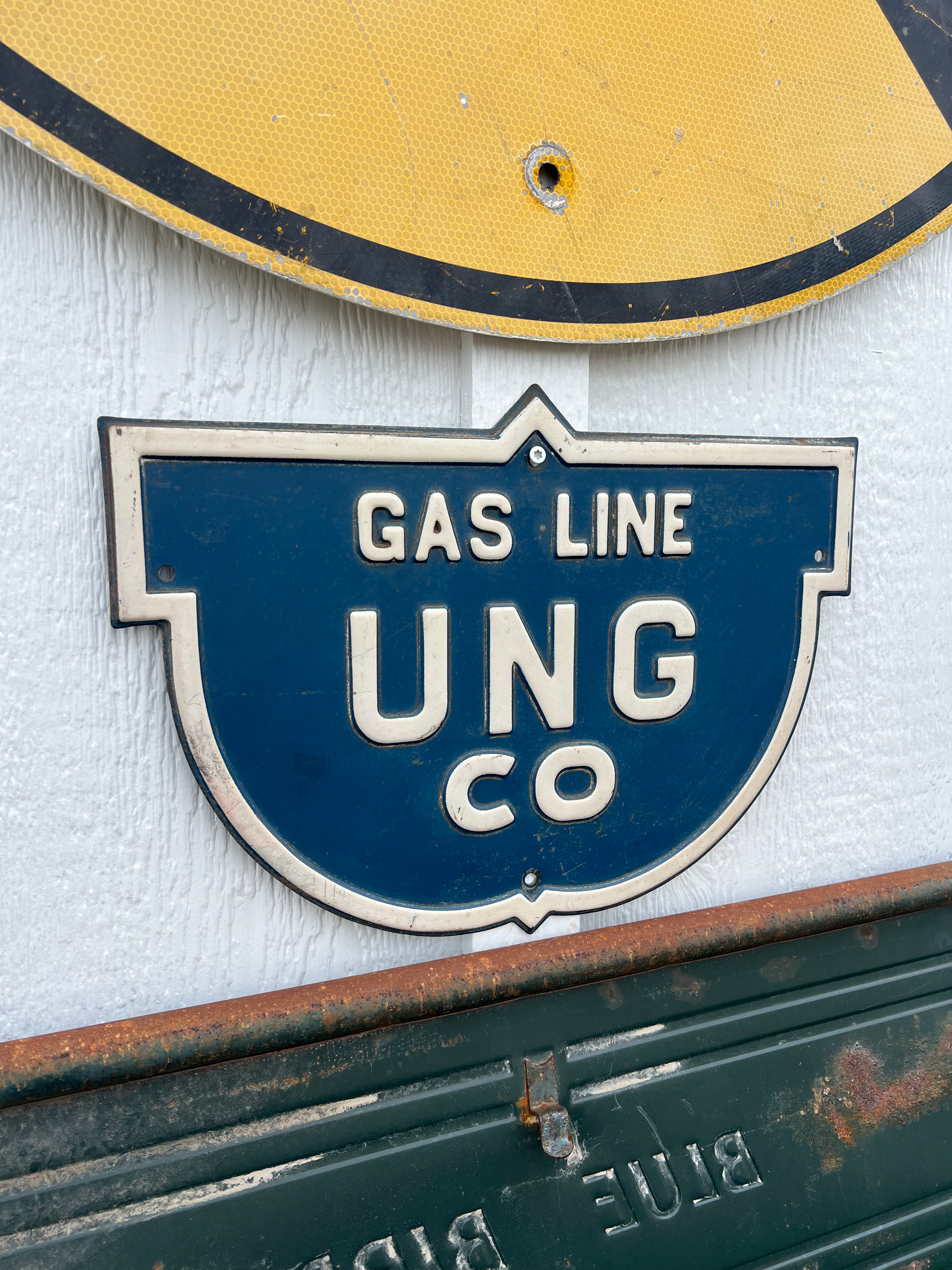 Embossed "Gas Line UNG Co" Salvage Sign
