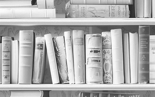 Vintage books on shelves — link to the Lagniappe Library free printables
