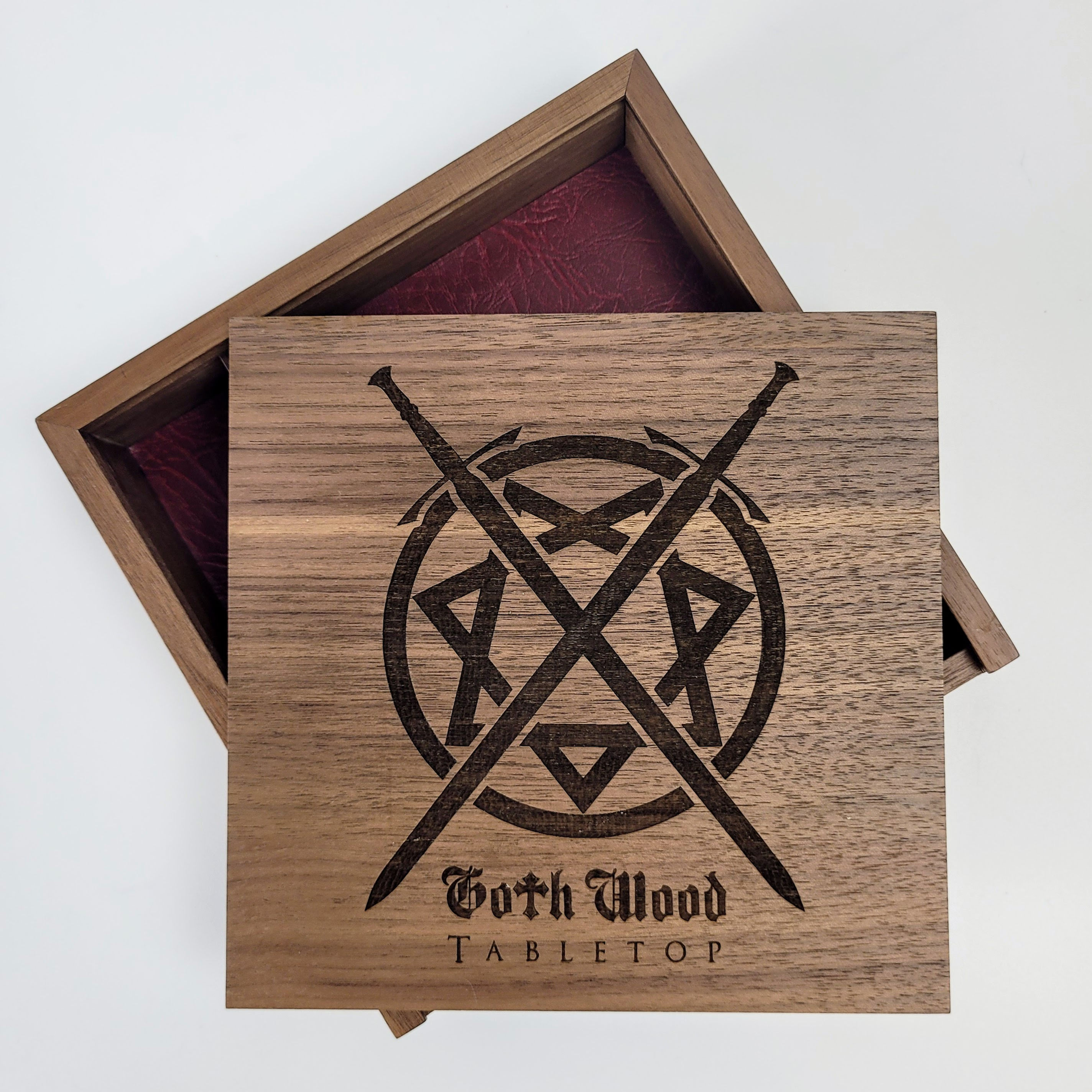 Portable dice tray made from walnut wood with deep red vegan leather and Goth Wood logo