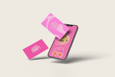 Coco Heart digital branding displayed on a smartphone with cookie packaging design.