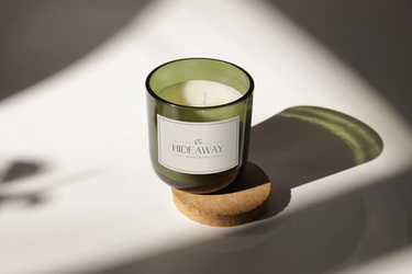 Hideaway at Río Celeste scented candle designed for a luxury wellness hotel experience.