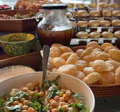 South Asian pani puri and chickpea chaat setup for cultural celebration catering in Central NJ