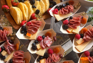 Charcuterie cones with pineapple berry board and garden salad for party catering in Central NJ