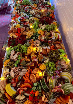 Flat lay styled grazing table with charcuterie and seasonal fruits for catering in Monmouth County NJ