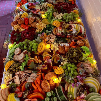 Flat lay styled grazing table with charcuterie and seasonal fruits for catering in Monmouth County NJ