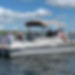 People on a pontoon boat