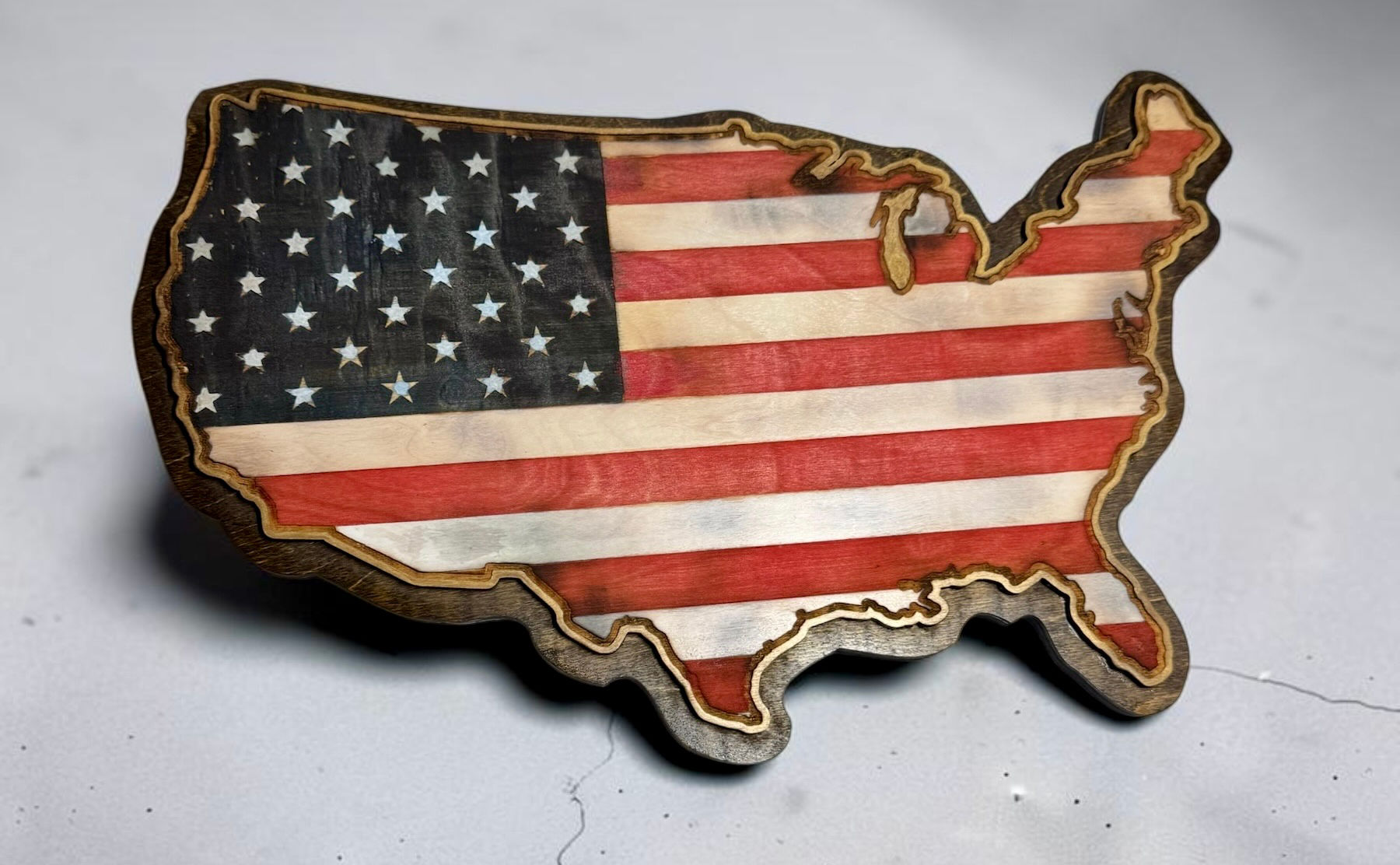 United States outline with American flag design wood