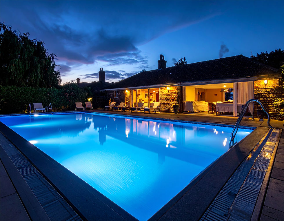 Firefly_dark blue hotel swimming pool with spa in UK setting 784338.jpg