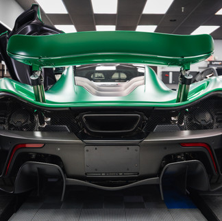Rear view of McLaren P1 showcasing satin XPEL Stealth PPF and motorsport-inspired finish at First Class Autosports