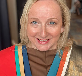 Client looking happy with her seasonal colour analysis draping.