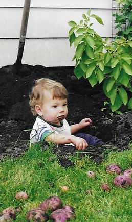 Lo eating dirt_edited.jpg