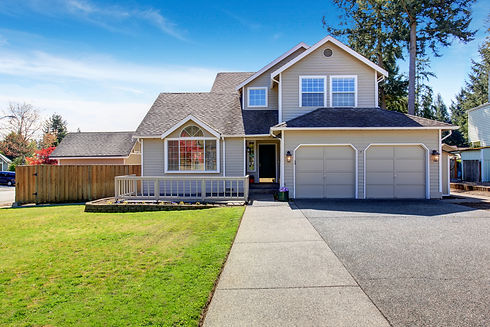 House exterior. View of entrance porch with walkway
