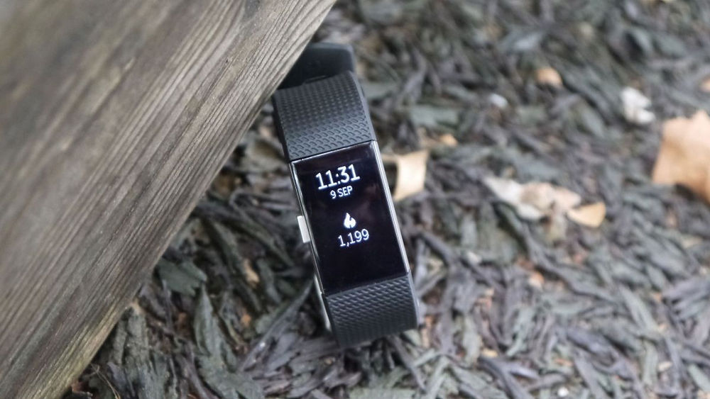 How do I restart my Fitbit device?