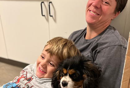 Therapy Dog in parents lap