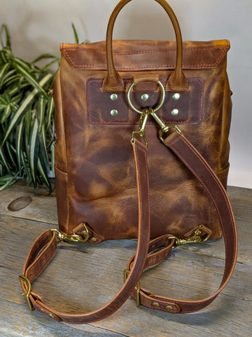 Leather backpack with adjustable straps