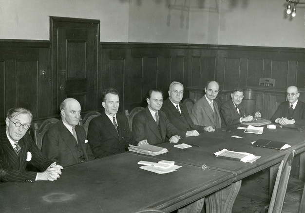 IMT judges, from L to R: Sir Norman Birkett (British alternate judge), Lord Geoffrey Lawrence (British judge and IMT Presiding Justice), Lieutenant Colonel Alexander Volchkov (Soviet alternative) Major General Iona T. Nikitchenko (Soviet main), Johnston J. Parker (USA alternate judge), Francis A. Biddle (USA main), Robert Falco (French alternate judge), John Henri Donnedieu de Vabres (French main).