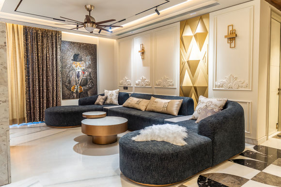 Elegant living room with designer furniture and artwork; RESIDENTIAL, luxurious interior design.