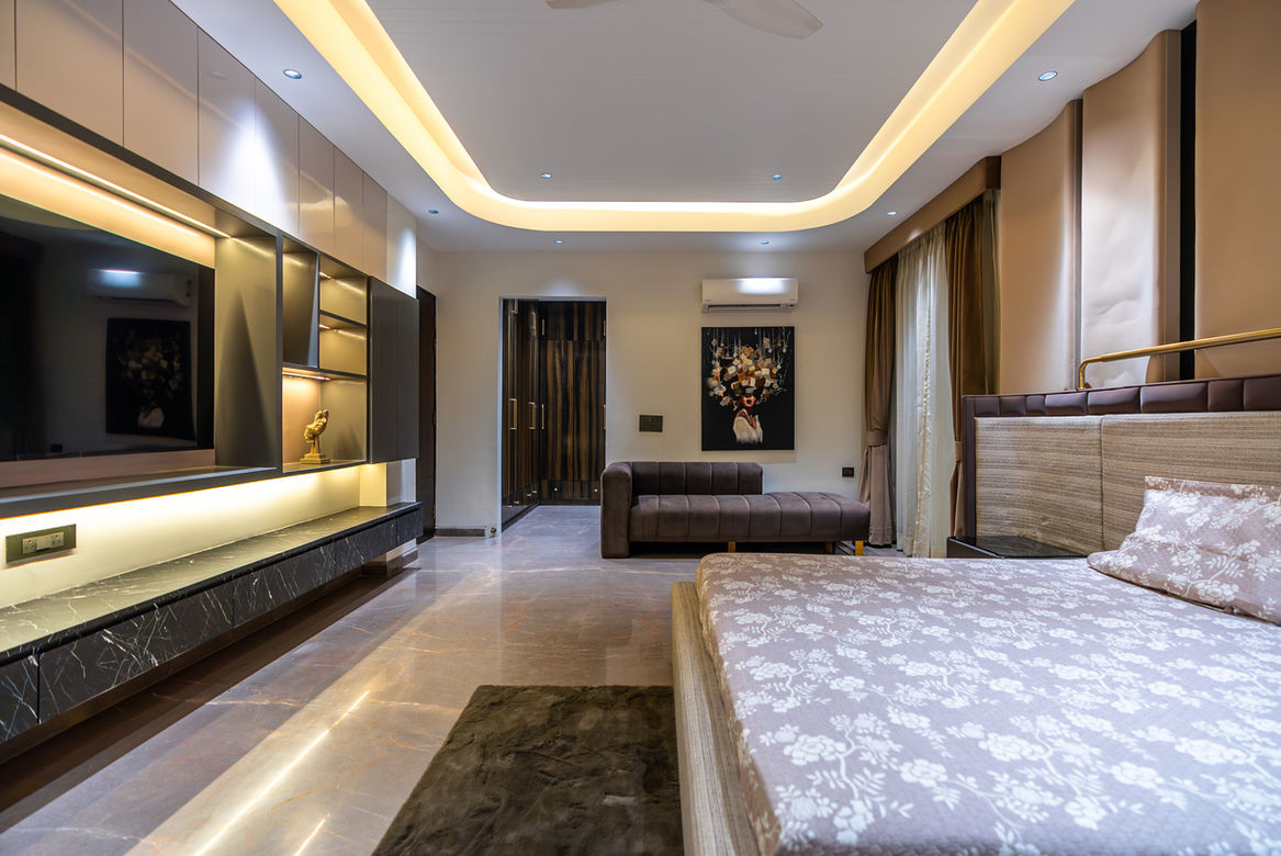 Modern bedroom interior with bed, shelves, sofa and artwork display RESIDENTIAL