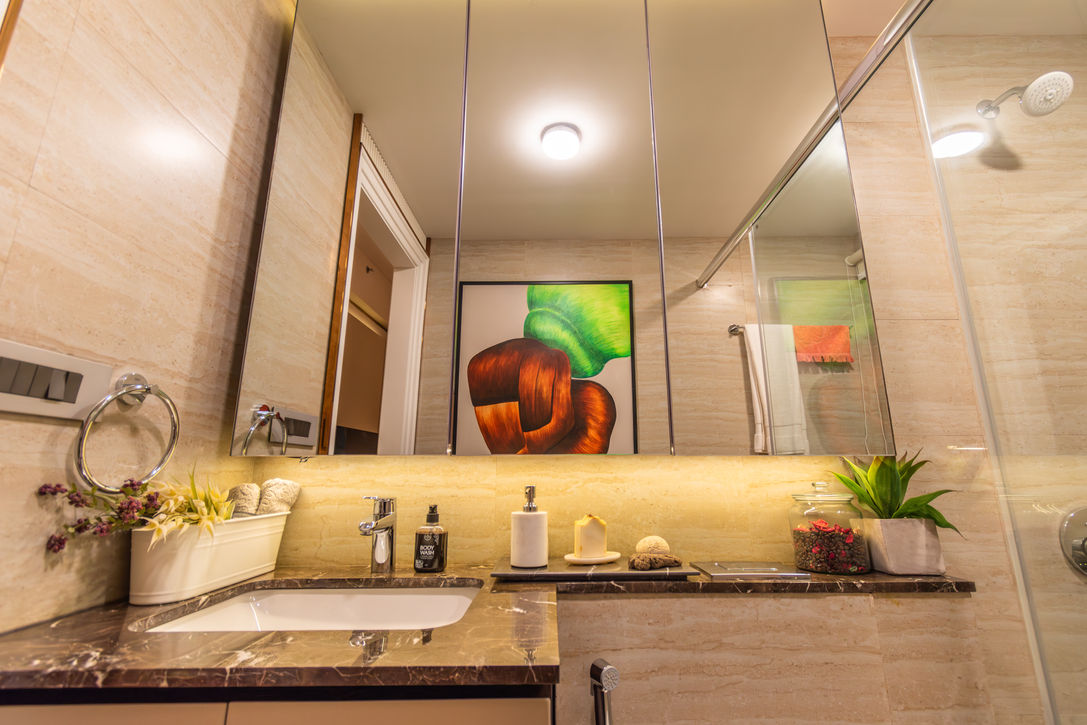 Bathroom mirror with artwork, sink, and accessories; RESIDENTIAL, interior design
