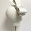 Thumbnail: Back view of silver beaded hat with bow displayed on a mannequin head