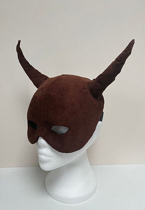 Brown suede half mask with horns displayed on mannequin head
