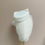 Thumbnail: Front view of an ivory bow bridal hat with veil displayed on a mannequin head